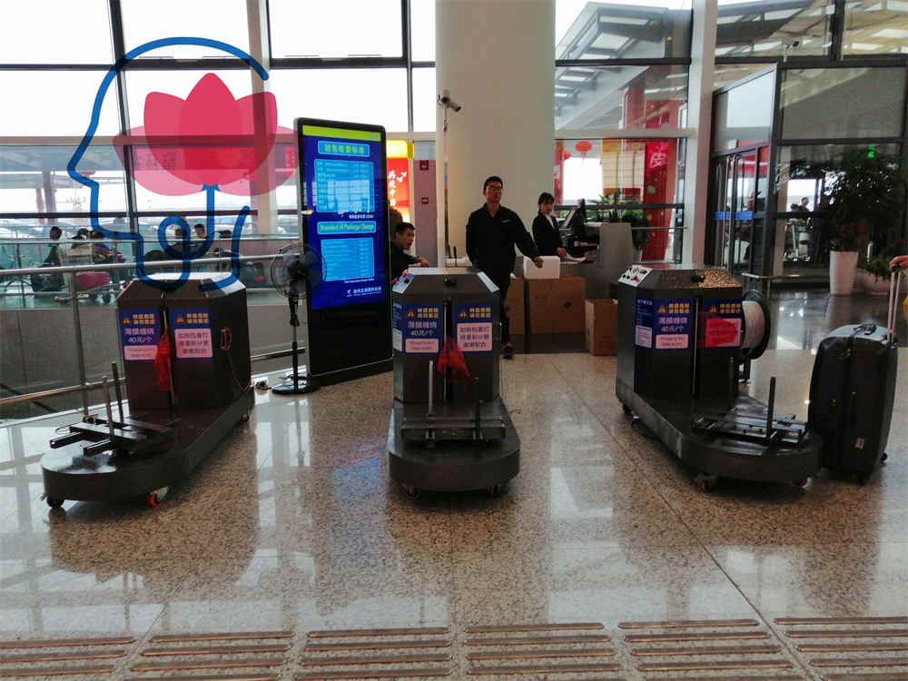 Aéroport utilisant des machines d'emballage de bagages