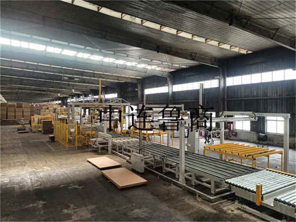 Système d'emballage intelligent pour les planches en bois fabriquées