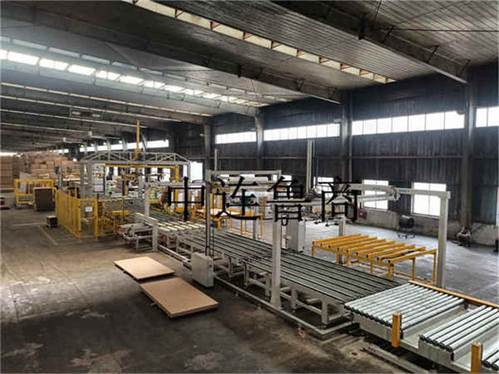 Système d'emballage intelligent pour les planches en bois fabriquées