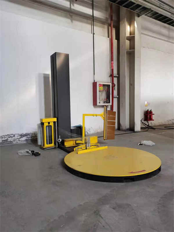 Machine d'emballage de palettes entièrement automatique