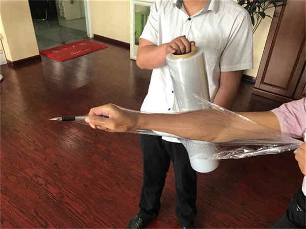 Machine d'emballage de palettes utilisant un film d'emballage